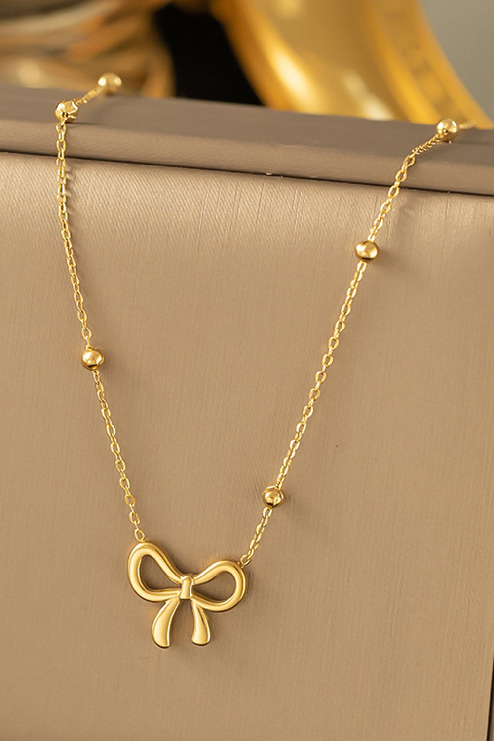 Gold Bowknot Pendant Choker Necklace